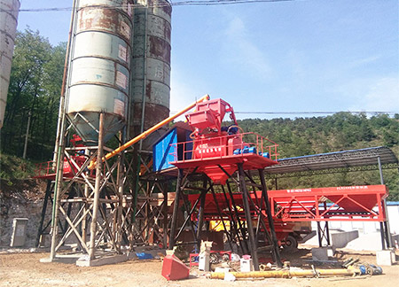 Zhengzhou Jianxin HZS50 concrete mixing plant equipment assisted the construction of rural roads   in Sanmenxia, ​​China.